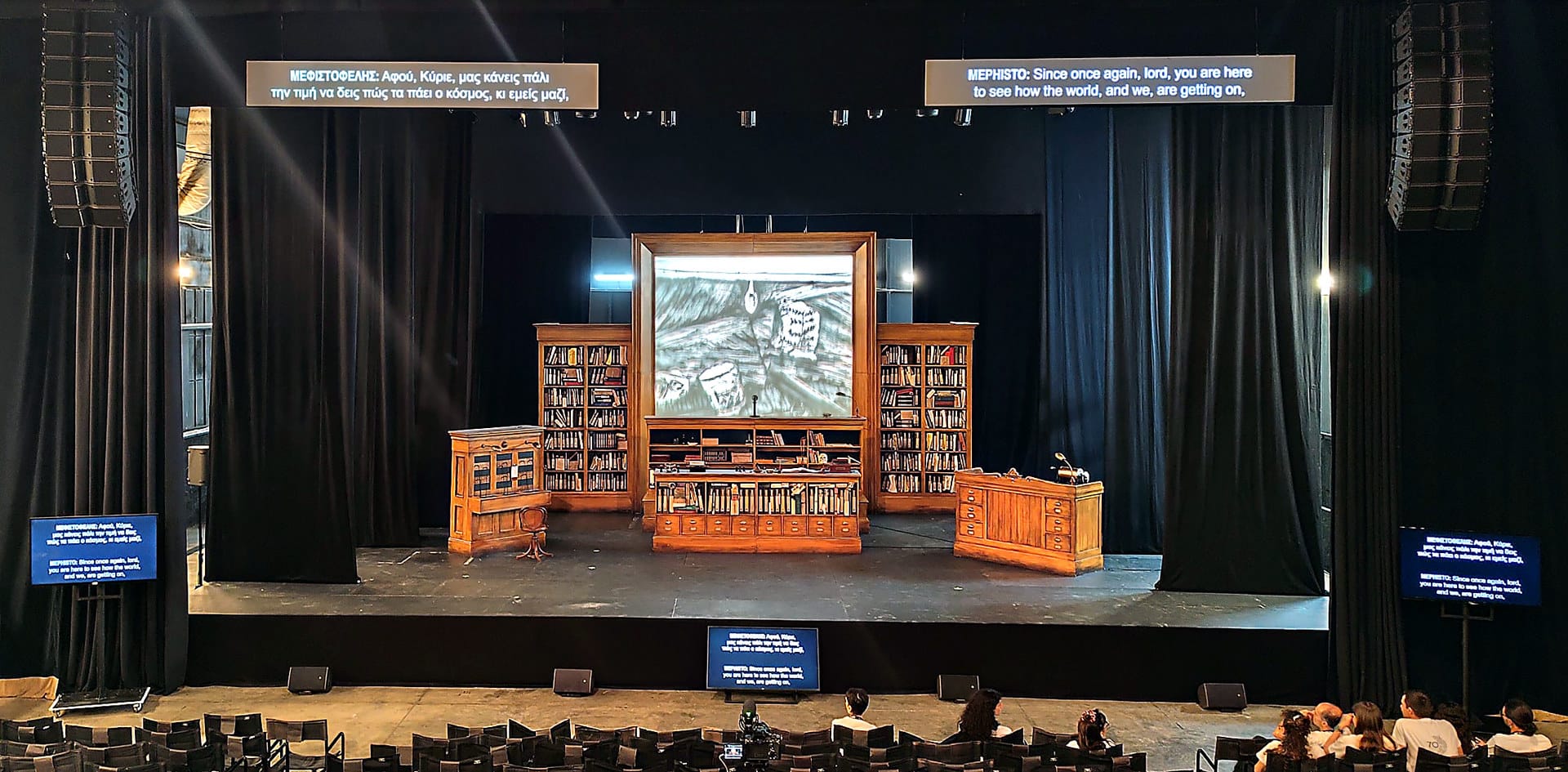 Live theater performance with audience